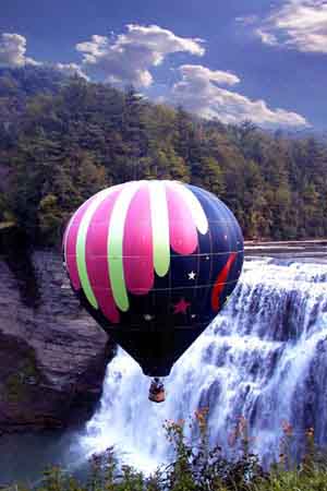 balloon over waterfall photograph
